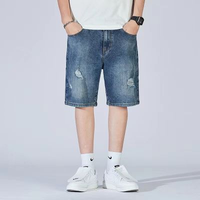 Ripped baggy denim shorts in blue