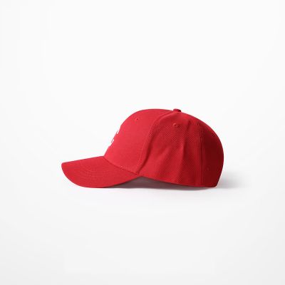 Red baseball cap with white embroidered C
