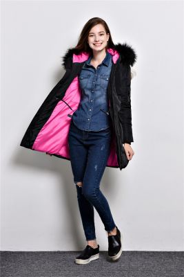 Long padded winter coat for women with fur hood and color contrast