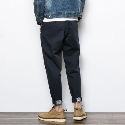 Chino pants for men with inside text printed on bottom cuff