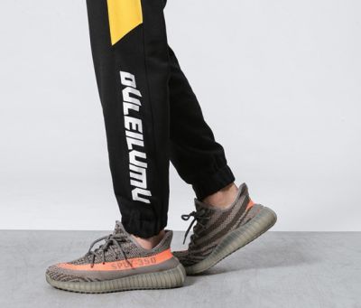 Sweatpants retro sportswear tracksuit trousers for men with bloc color contrast