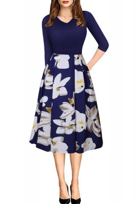 Long sleeve dress with black top and flower print skirt