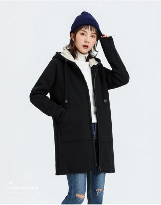 Thick winter coat for women with faux fur hood.