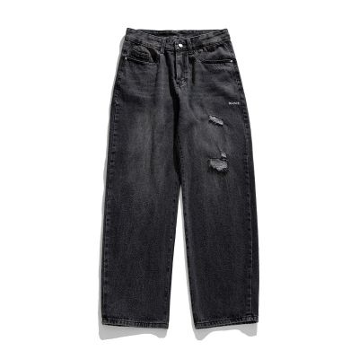 Wide straight leg jean with rip for men.
