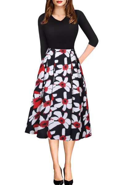 Long sleeve dress with black top and flower print skirt